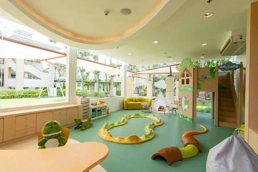 Sheraton children’s playroom with small tables, toys and large windows