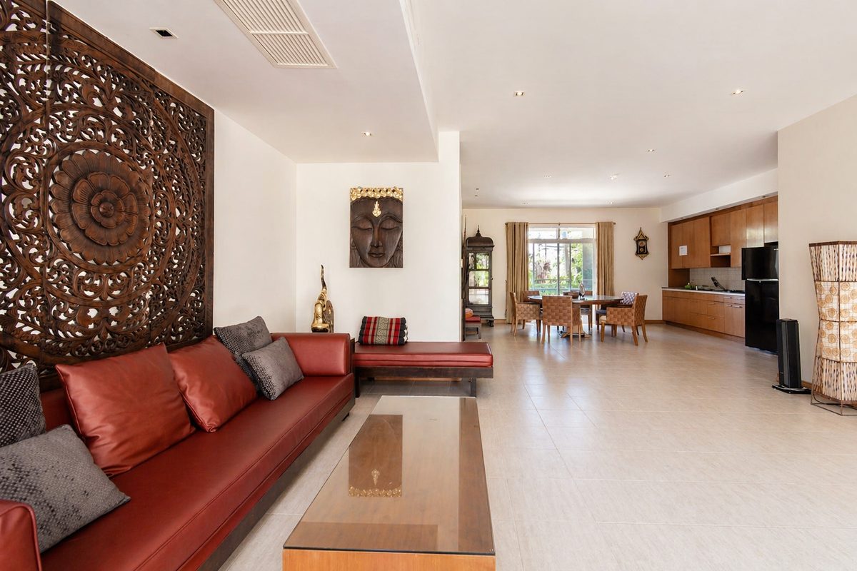 Open-plan view from the living room through dining to the kitchen